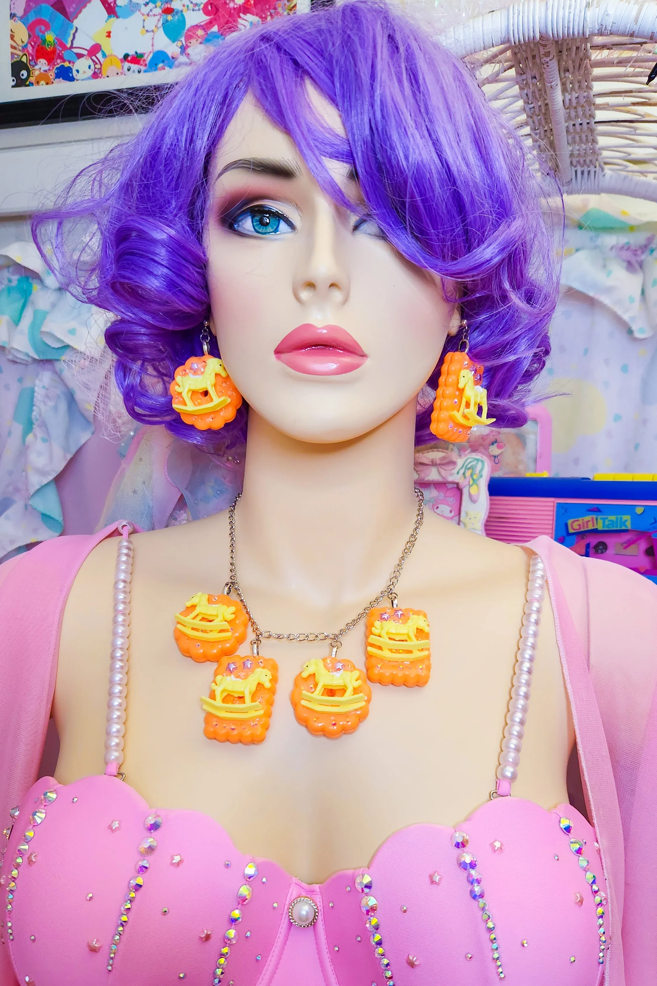 Orange cracker biscuit rocking horse charm necklace